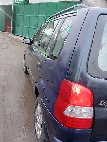 новое авто: Mazda Demio: 2002 г., 1.3 л, Механика, Бензин, Хэтчбэк — 4
