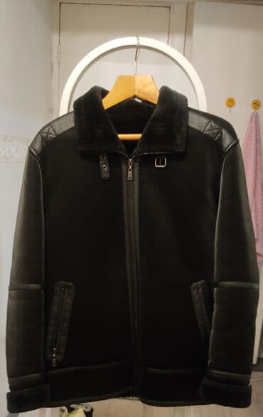 Плащи: Продаю Мужская дублёнка (пилот) черного цвета. 52 размер. - Материал — 1
