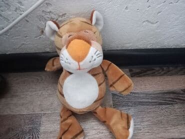 интерактивная игрушка: Мягкая игрушка в виде тигра с характерным окрасом. Игрушка выполнена в — 1