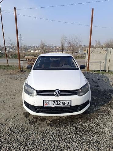 Volkswagen Polo: 2012 г., 1.6 л, Механика, Бензин, Седан