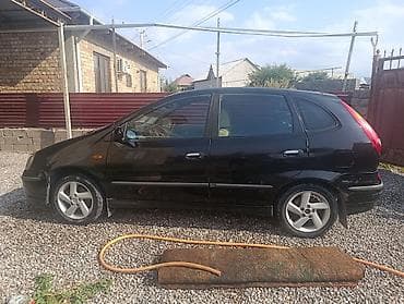 салон машина: Nissan Almera Tino: 2003 г., 1.8 л, Механика, Бензин, Хэтчбэк — 2