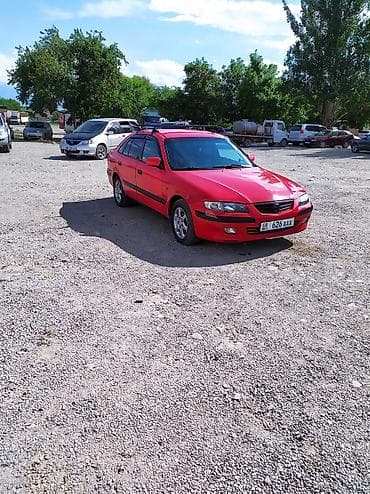 демио 2005: Mazda 626: 2000 г., 2 л, Ручные, Бензин, Хэтчбэк — 8