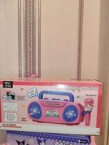 Детская магнитола с микрофоном можно подключить к телефону и петь