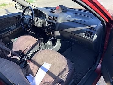 ун басандаткыч: Mazda 626: 1998 г., 1.8 л, Кол менен иштөөчү, Бензин, Седан — 8