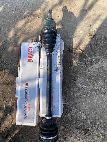 Передний амортизатор Subaru 2001 г., Б/у, Аналог — 4