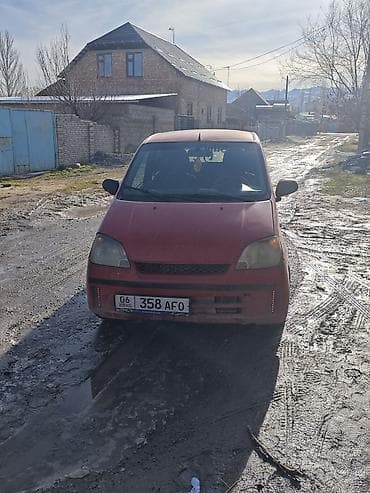 бычок лимузин: Daihatsu Cuore: 2004 г., 1 л, Механика, Бензин, Хэтчбэк — 2