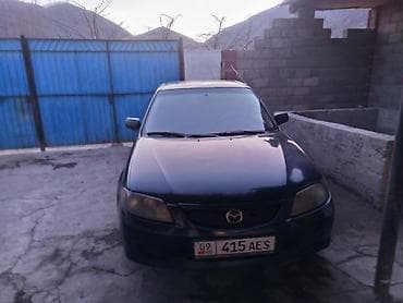 мазда крыло: Mazda Familia: 2001 г., Бензин, Седан — 5