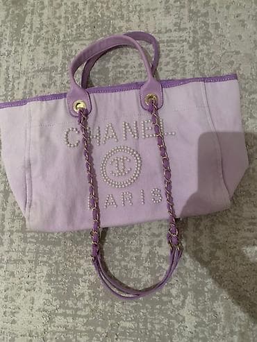 Другие комплектующие: Сумка-тоут Chanel, сиреневого оттенка. Особенности: - Материал — 1