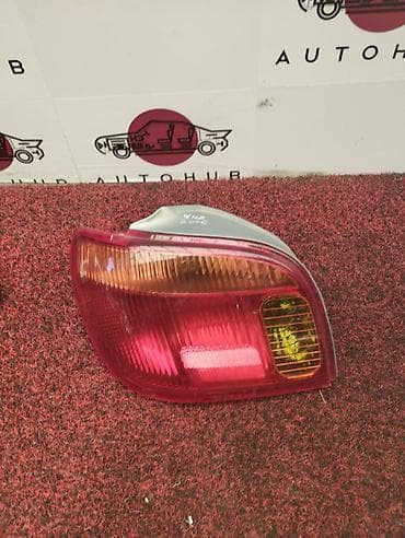 Фонарь заднего хода левый для TOYOTA Vitz, год выпуска авто: 2005. - — 1