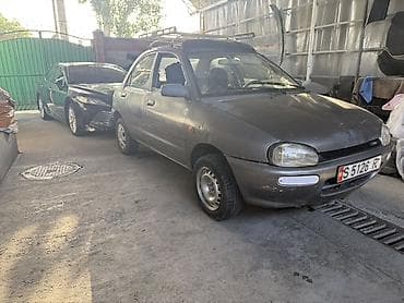 lancer evolution: Mazda 121: 1991 г. — 3