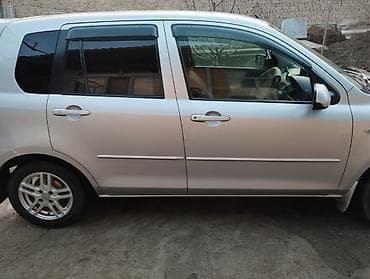 byd plus: Mazda Demio: 2004 г., 1.4 л, Автомат, Бензин, Седан — 3