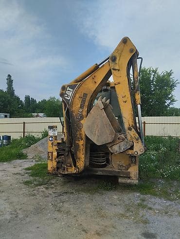 Экскаватор, Caterpillar, 2005 г., Дөңгөлөктүү — 2