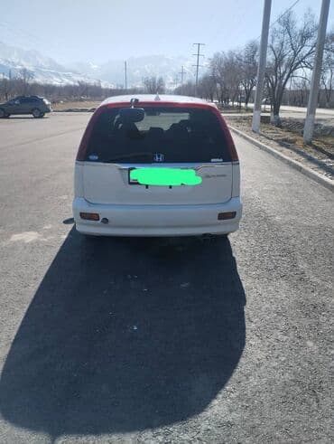 средний кузов да: Honda Stream: 2002 г., 2 л, Автоматические, Бензин, Универсал — 2