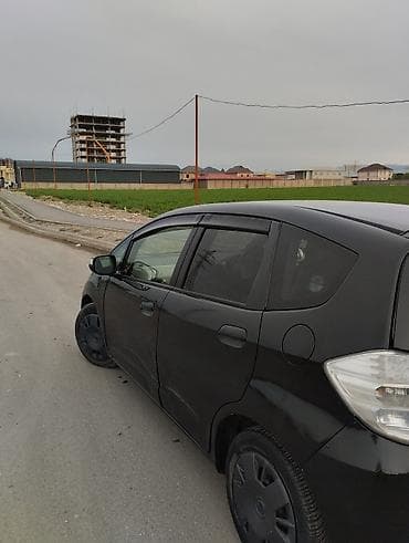 t 25: Honda Fit: 2013 г., Вариатор, Гибрид, Хэтчбэк — 9