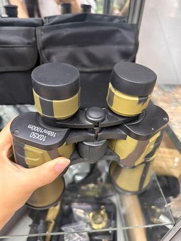 бинокли военные: Бинокль с камуфляжной расцветкой, оснащенный линзами 10x50 — 1