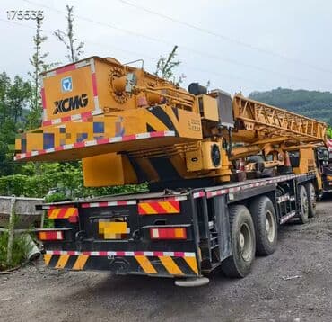 на железных номерах: Автокран, XCMG, 2014 г., от 30 м — 4