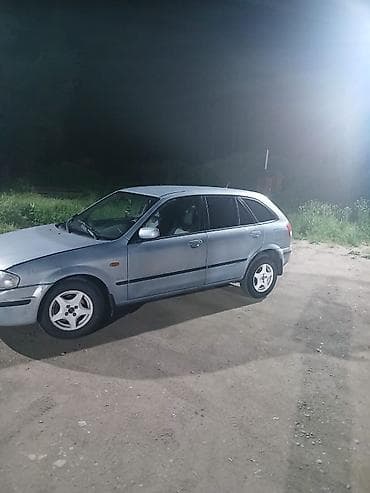 Mazda 323: 2002 г., 1.8 л, Механика, Бензин, Хэтчбэк