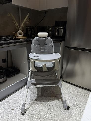 детскую качельку: Детский стульчик для кормления с регулировкой и колесами — 2