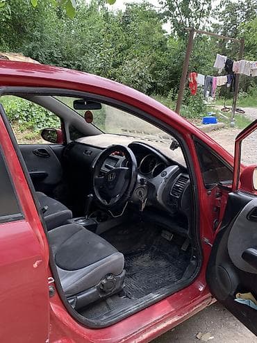 электромобиль дешевый: Honda Fit: 2001 г., Автомат, Бензин, Хэтчбэк — 6