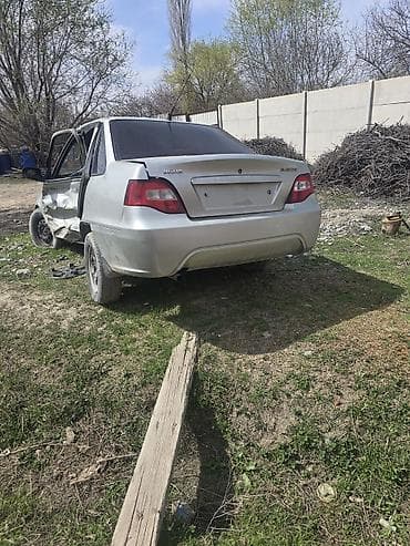 по запчастям: Daewoo Nexia (седан), серебристый цвет. Автомобиль после серьезного — 3