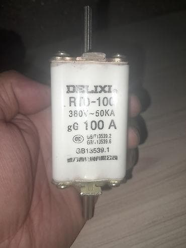 Трансформатор үчүн сактагычтар: Плавкий предохранитель DELIXI RT0-100 - Номинальный ток: 100 A (gG) - — 1
