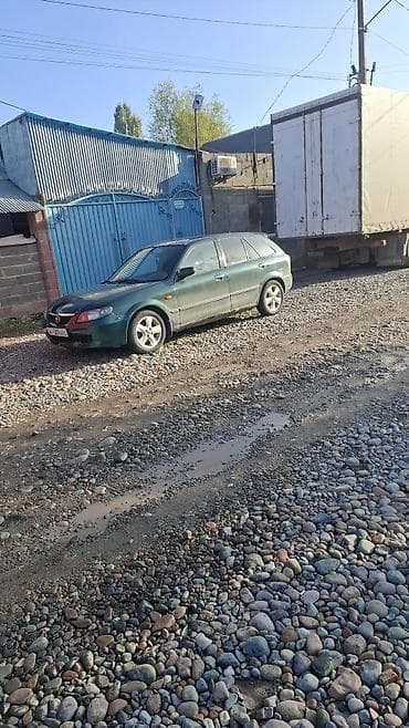 Mazda 323: 2002 г., Механика, Хэтчбэк