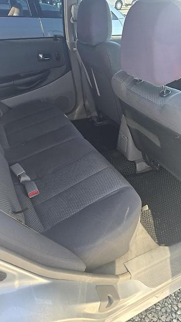 mini cuper: Mazda 323: 2002 г., 1.6 л, Ручные, Бензин, Универсал — 8