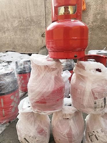 Пропан-бутановые газовые баллоны красного цвета. - Материал: стальной