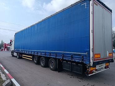 токмок зеркало: Сүйрөгүч, DAF, 2019 г., Тенттелген — 5