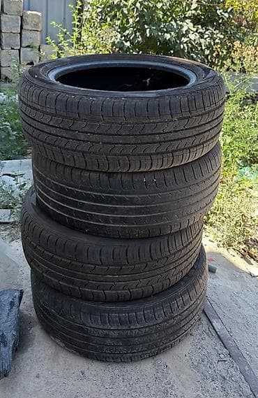 Транспорт: Комплект из 4 летних шин P215/55 R17 94V. - Тип: летние, дорожный — 4