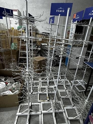 Напольные вращающиеся торговые стойки-карусели с крючками -
