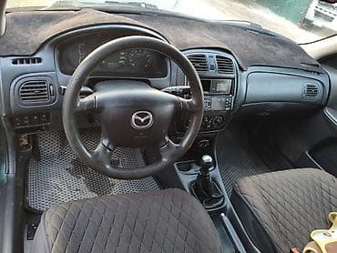 дайхатсу фероза: Mazda 323: 2000 г., 1.6 л, Механика, Бензин, Универсал — 5
