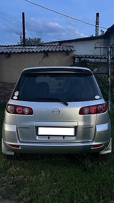 гов 2: Mazda Demio: 2004 г., 1.3 л, Автомат, Бензин, Хэтчбэк — 1