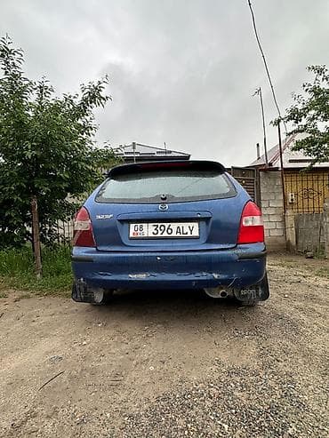 Транспорт: Mazda 323: 2001 г., 1.6 л, Кол менен иштөөчү, Бензин, Хетчбек — 4