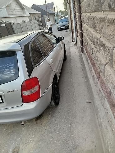 2000: Mazda 323: 1999 г., Механика, Бензин, Универсал — 5
