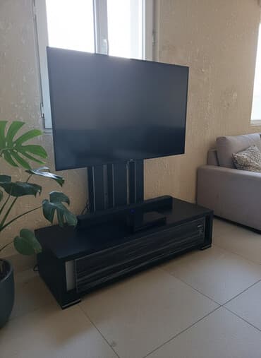 подвесные тумбы: Тумба и подставка для телевизора, Напольная, ЛДСП, цвет - Черный — 1