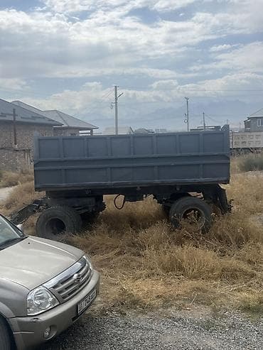 жоский буксир: Прицеп-самосвал двухосный (тележка) для грузового автомобиля. - Тип — 4
