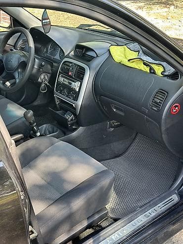 мурабаха машина: Mitsubishi Carisma: 2003 г., 1.6 л, Механика, Бензин, Хэтчбэк — 7