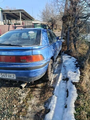 демио бампер: Mazda 323: 1992 г., 1.6 л, Механика — 5