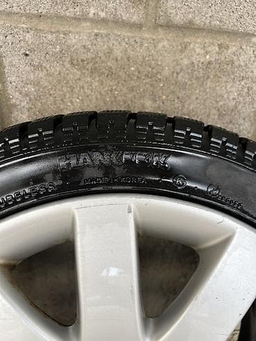 Шины и диски: Литой диск Nissan с шиной Hankook - Оригинальный легкосплавный диск — 2