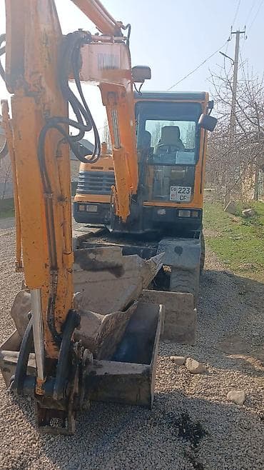 Экскаватор, Hyundai, Колесный