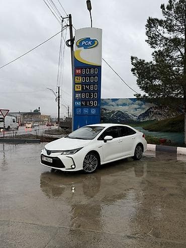 mini kuper: Toyota Corolla: 2021 г., Гибрид, Седан — 7