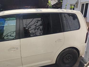 для такси авто: Volkswagen Touran: 2010 г., 1.9 л, Автомат, Дизель, Минивэн — 4
