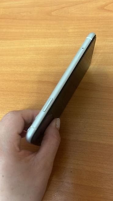 Техника жана электроника: IPhone 11, белый цвет Характеристики и детали с фото: - Память: 64 ГБ — 6
