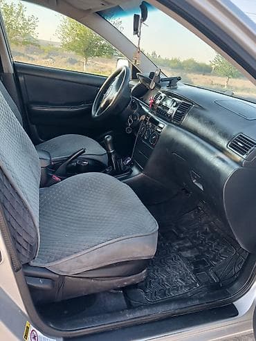 тайота каролла 2005: Toyota Corolla: 2002 г., Бензин, Хэтчбэк — 5