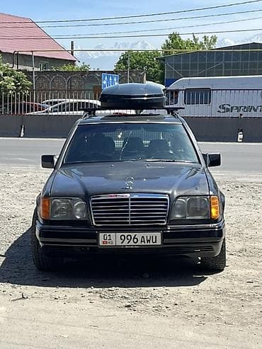 значок от мерса: Mercedes-Benz W124: 1995 г., Универсал — 4