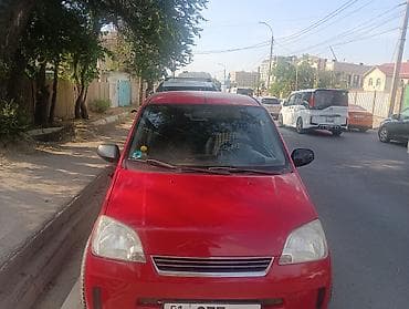 лифтбек: Daihatsu Cuore: 2004 г., 1 л, Механика, Бензин, Лифтбек — 2