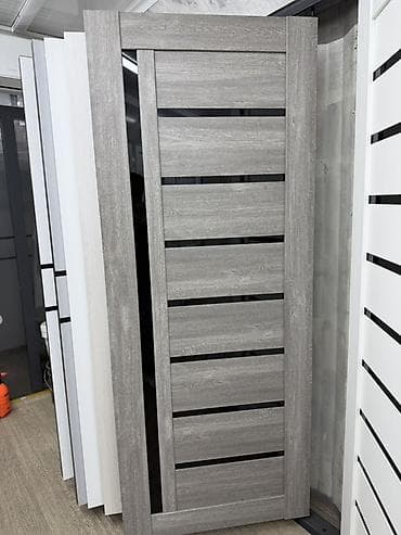 Межкомнатная дверь современного дизайна в оттенке серого дуба. Полотно