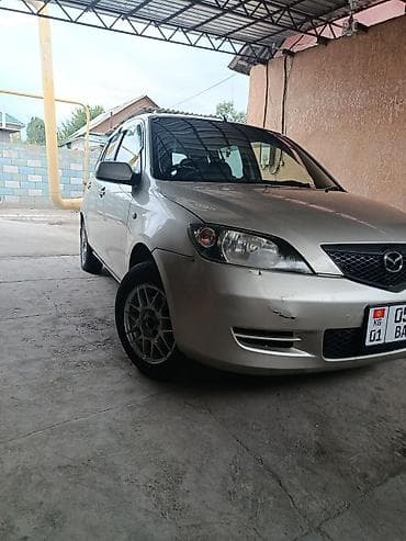 Транспорт: Mazda Demio: 2003 г., Бензин, Хэтчбэк — 2