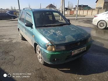 bmw e92: Mazda Demio: 1999 г. — 2